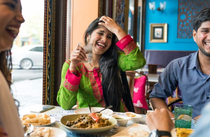 tourists enjoying food at a restaurant near Taj Mahal in Agra