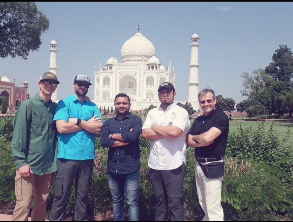 Travelers visiting the Taj Mahal on a day trip from Delhi
