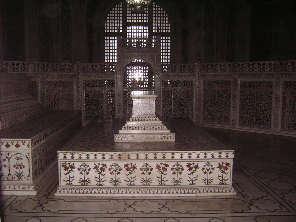 The richly decorated marble cenotaph of Mughal Emperor Shah Jahan inside the Taj Mahal